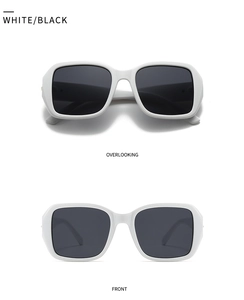 Detailed views of stylish white square oversized sunglasses with dark black lenses