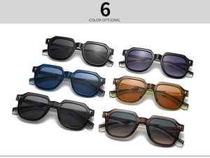 Close-up of stylish polygonal sunglasses showing arrow-shaped metal details and color options