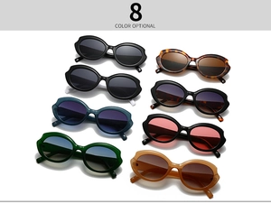 Flat lay of retro oval sunglasses showing eight optional colors and thick resin frames