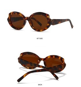 Detailed view of tortoiseshell sunglasses featuring irregular frames and dark lenses