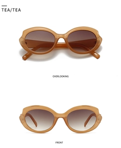 Front and top view of oversized amber cat-eye sunglasses with tea gradient lenses