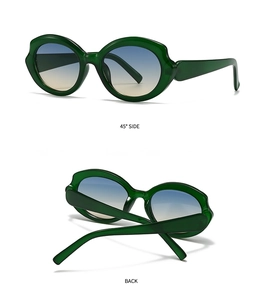 Detail of dark green translucent polygon sunglasses with blue gradient lenses and side view