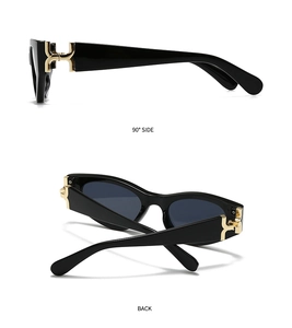 Détail de lunettes de soleil carrées avec charnière en H dorée sur monture noire, vues