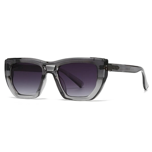 Modern square sunglasses in transparent grey frame with dark gradient lenses
