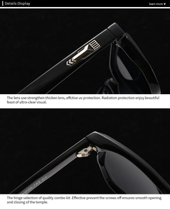 Close-up of black sunglasses with gold geometric hinges and UV protection details