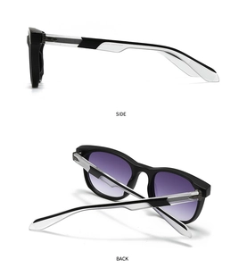 Detail view of black sunglasses side and back with purple gradient lenses and metal hinge
