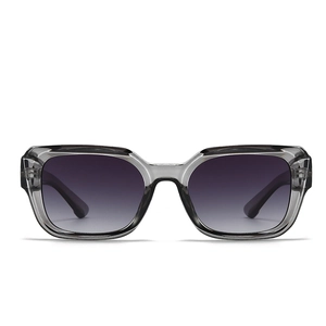Close-up of square translucent grey sunglasses with gradient lenses and metal hinges