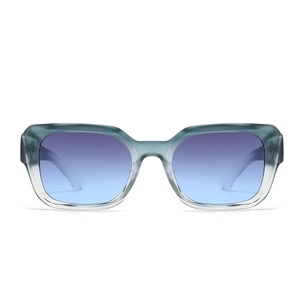 Front view of retro square sunglasses with translucent grey-blue frames and blue gradient lenses
