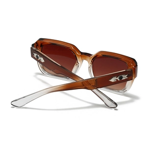 Detail of square gradient brown sunglasses featuring silver arrow metal hinge accents