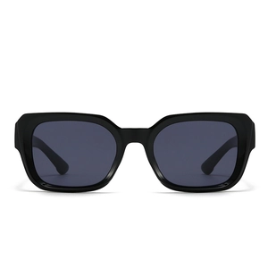 Close-up of modern oversized square sunglasses with black frames and dark grey lenses