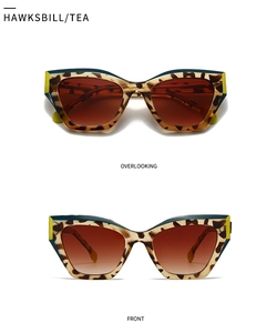 Front and top view of cat eye tortoiseshell sunglasses with green and yellow accents