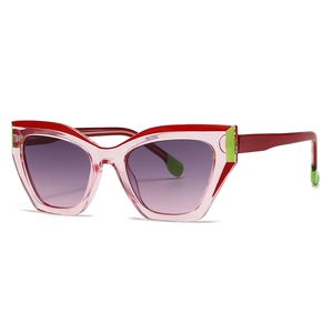 Modern cat-eye sunglasses with transparent pink frame and gradient purple to pink lenses
