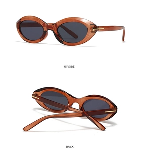 Detailed views of amber retro oversized sunglasses with golden T-shaped metal hinges