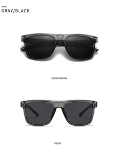 Detail view of square gray sunglasses with translucent frames and black lenses