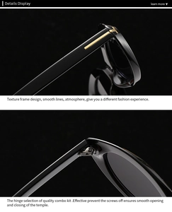 Detailed macro view of the metal T-shaped hinge on black glossy retro oversized sunglasses