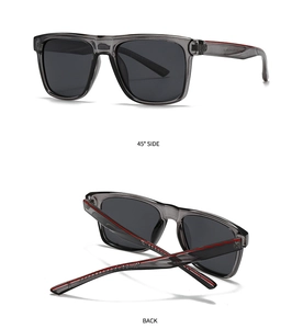 Detailed view of square polarized sunglasses with grey transparent frame and red stripe