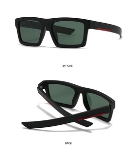 Detail view of square matte black sunglasses featuring a signature red stripe on temple