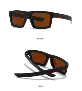 Macro view of square frame sunglasses with orange lenses and red stripe on temple