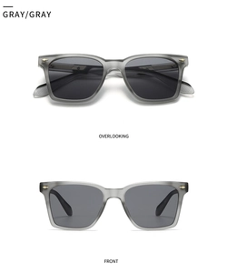 Détails des lunettes de soleil gris mat avec verres fumés et rivets métalliques dorés fins