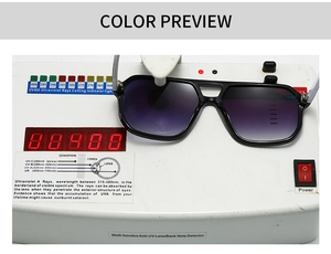 Detail view of black aviator sunglasses with UV400 test showing UV protection capability
