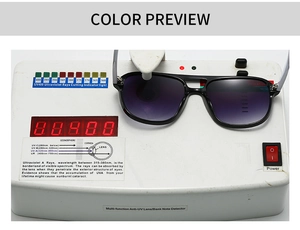 Sonnenbrille mit lila Verlaufsgläsern und UV400-Schutz auf einem Prüfgerät gezeigt