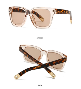 Detail of tortoise shell temples with gold metal cutout on square frame sunglasses