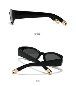 Detailed side and back views of black cat-eye sunglasses with gold metal geometric tips