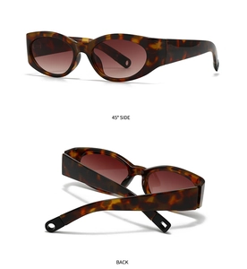 Detail view of tortoiseshell cat eye sunglasses with brown lenses from 45 degree and back