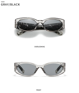 Front and top view of oval cat-eye sunglasses with transparent grey frames and smoke lenses