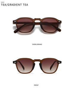 Detail view of tea gradient lenses and silver triangle rivets on retro square sunglasses