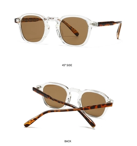 Detail of transparent frame sunglasses with classic leopard print temple tips and brown lenses