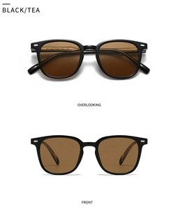 Vue détaillée des lunettes de soleil carrées noires avec armature métal et verres thé