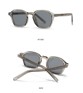 Détail de lunettes de soleil vintage grises montrant le côté à 45° et le pliage arrière