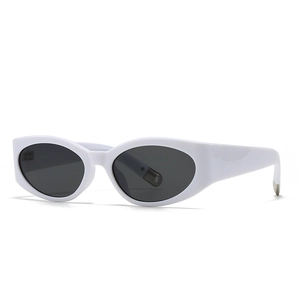 Fashionable thick white cat-eye sunglasses with oval dark lenses and metallic end tips