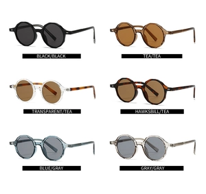 Six coloris de lunettes de soleil rondes rétro à coupe géométrique sur fond blanc pur
