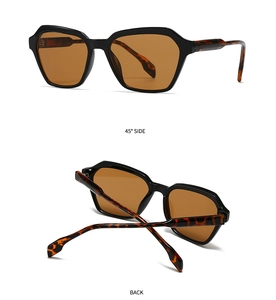 Detail view of stylish square sunglasses with tortoise temples and dark brown lenses