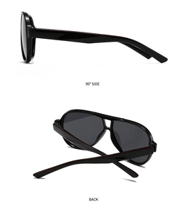 Detail view of black full-rim sunglasses showing side profile with red stripes and back fold