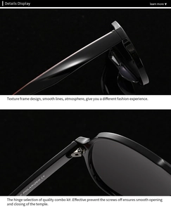 Detail view of round polarized sunglasses featuring a glossy black frame and metal hinges
