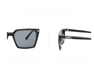 Detailed side view of black square sunglasses with decorative gold metal hardware on temples
