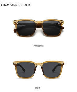 Close-up of champagne amber frame sunglasses with polarized lenses and silver rivets