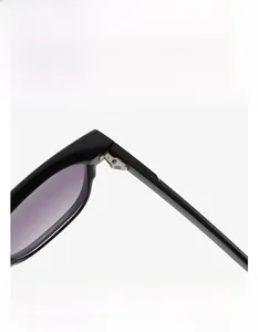 Detailed macro view of the durable metal hinge on these square black frame sunglasses
