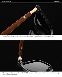 Detail view of round frame sunglasses showing wood-grain temple and gold durable hinge