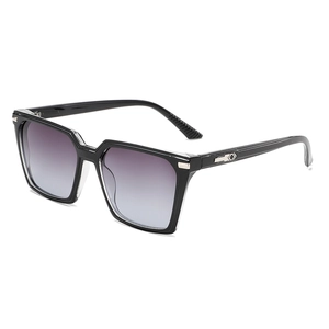 Modern square sunglasses with black gradient lenses and silver diamond side accents