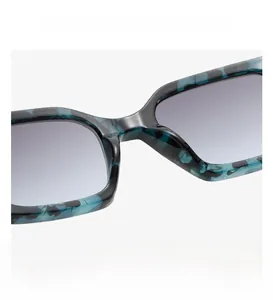 Close-up of marble teal sunglasses frame featuring comfortable integrated nose pads