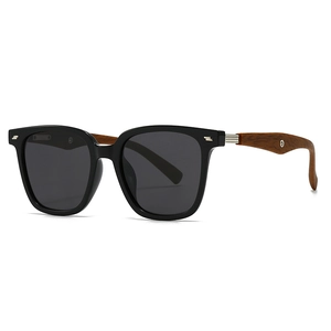 Polarized round sunglasses with black frame and walnut wood grain arms on white background