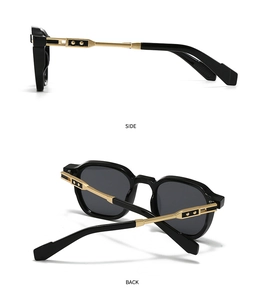 Detail view of gold-metal temples and star-shaped accents on aviator sunglasses