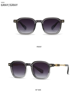 Detail view of transparent grey pilot sunglasses with gradient lenses and gold metal accents