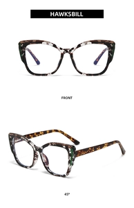 Front and 45-degree angle views of tortoiseshell blue light blocking glasses frames