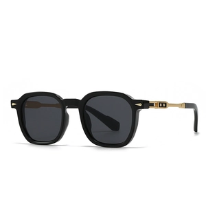 Classic pilot-style round frame sunglasses with black frames and gold metal star details