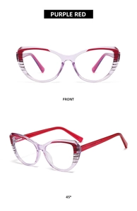 Detail view of purple red cat eye glasses with striped texture and translucent frames